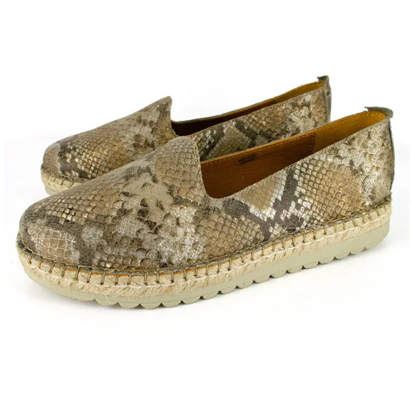 Pair of snake print espadrilles on a white background