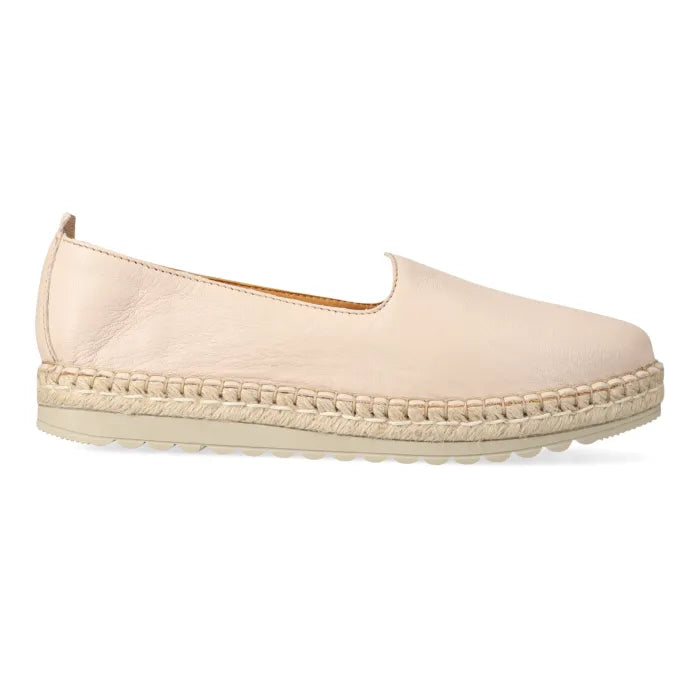 Beige espadrille shoe on a white background