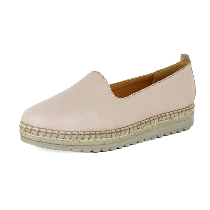 Beige espadrille shoe on a white background