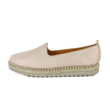 Beige espadrille shoe on a white background