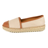 Beige espadrille shoe with brown accents on a white background