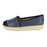 Navy blue espadrille shoe on a white background