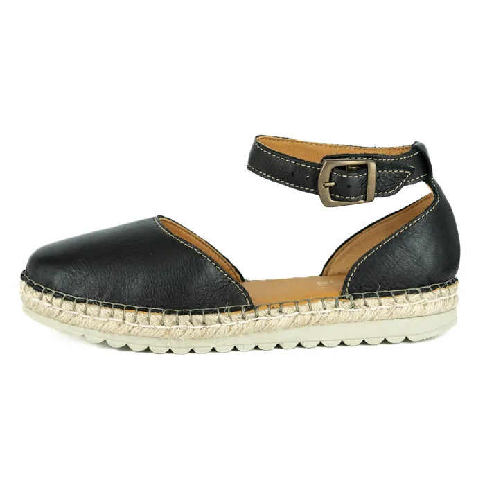 Black espadrille sandal with a beige sole on a white background
