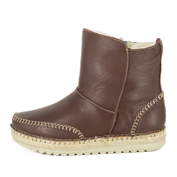 Brown leather boot with espadrille sole on a white background