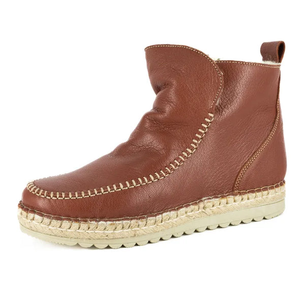Brown leather espadrille wedge shoe on a white background