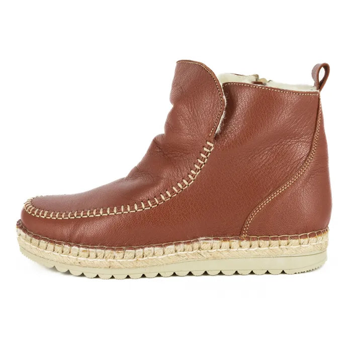 Brown leather espadrille shoe on a white background