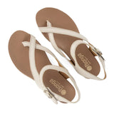 Pair of beige sandals with cream straps on a white background