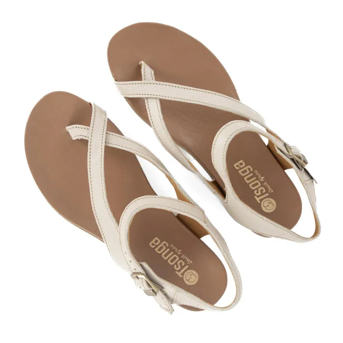 Pair of beige sandals with cream straps on a white background