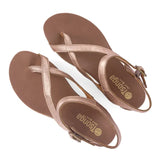 Pair of rose gold sandals with 'Tsonga' branding on a white background