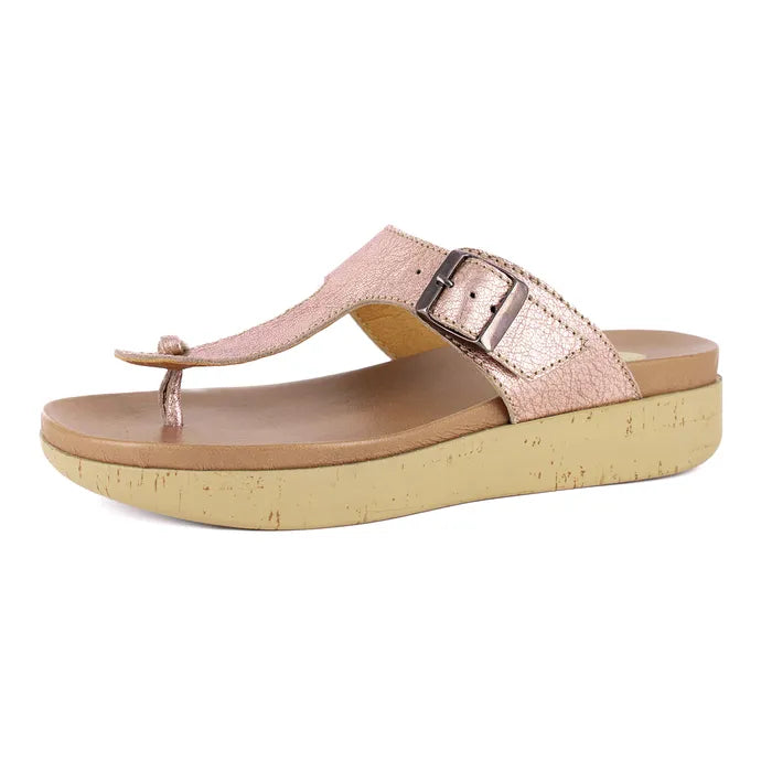 Rose gold sandal with cork print sole on a white background