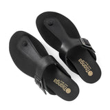 Pair of black sandals with 'Tsonga' branding on a white background