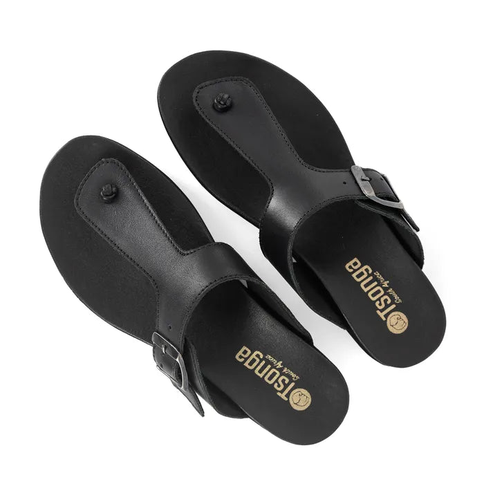 Pair of black sandals with 'Tsonga' branding on a white background