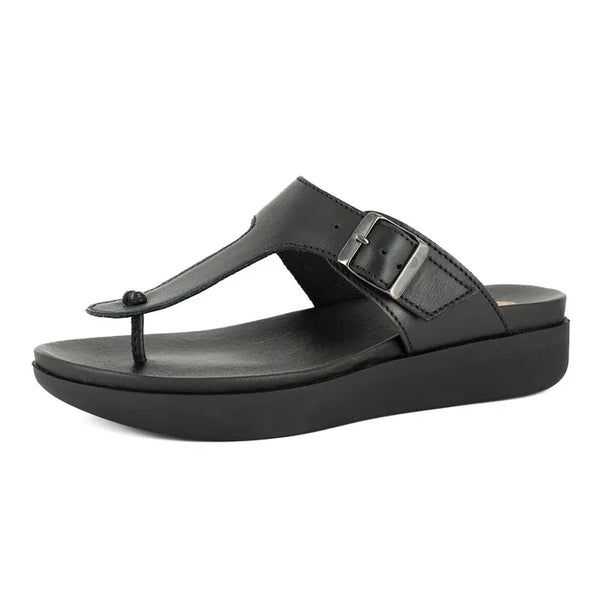 Black sandal with a strap on a white background