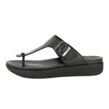 Black sandal with a buckle on a white background