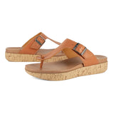 Pair of brown sandals with cork print sole on a white background