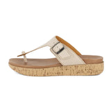 Beige sandal with cork print sole on a white background