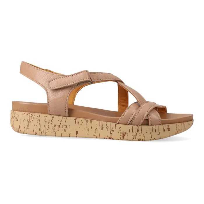 Timber sandal with cork print platform sole on a white background
