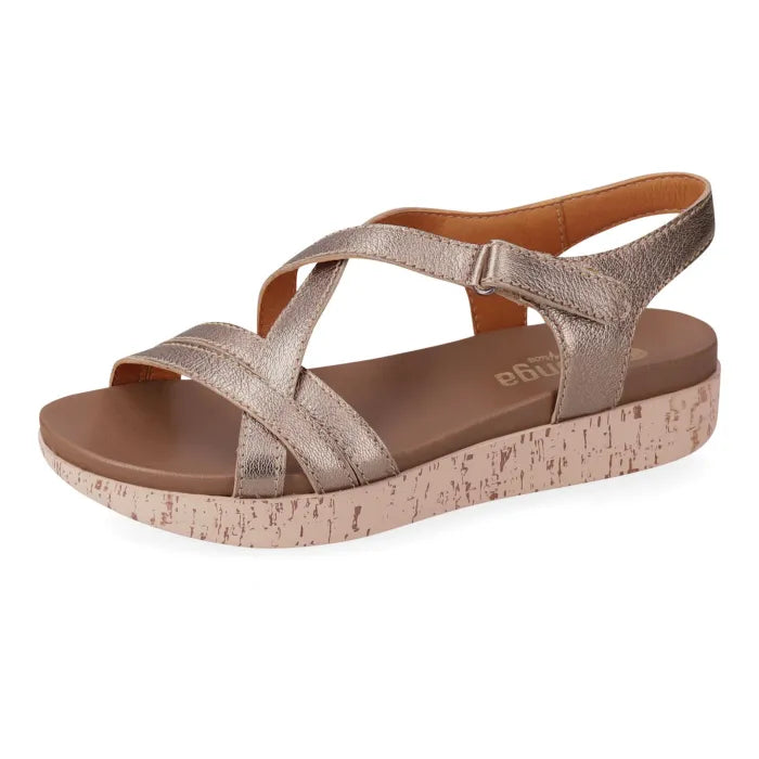 Gold sandal with cork look sole on a white background