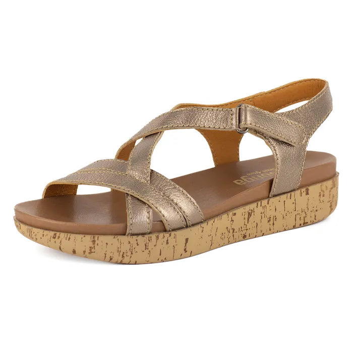 Gold sandal with cork print sole on a white background