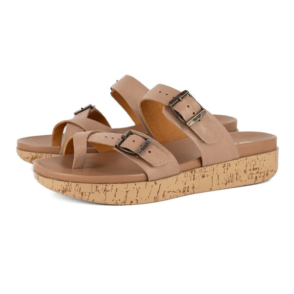 Beige sandals with cork print platform sole on a white background