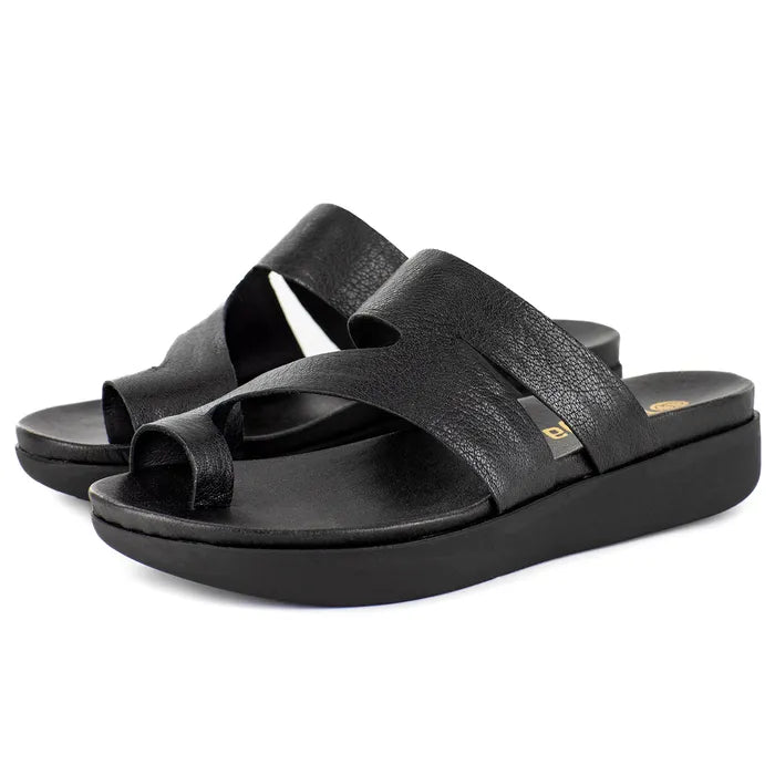 Black sandals with criss-cross straps on a white background