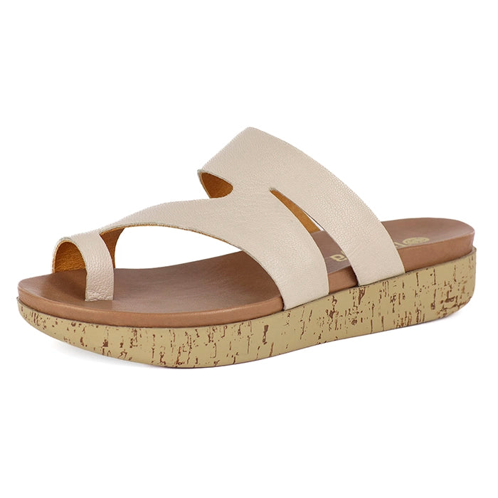 Beige sandal with cork sole on a white background