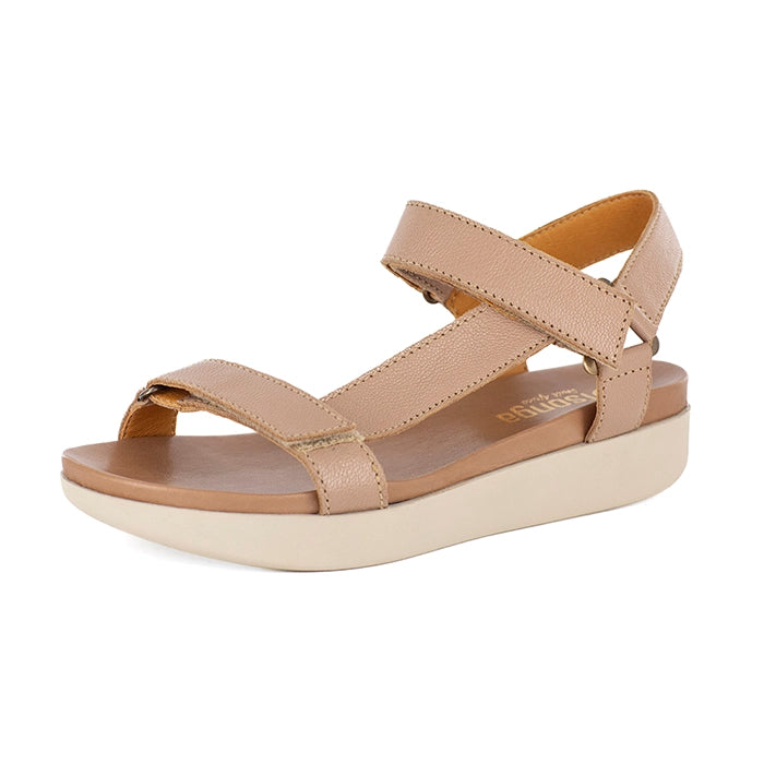 Beige sandal with a off-white sole on a white background
