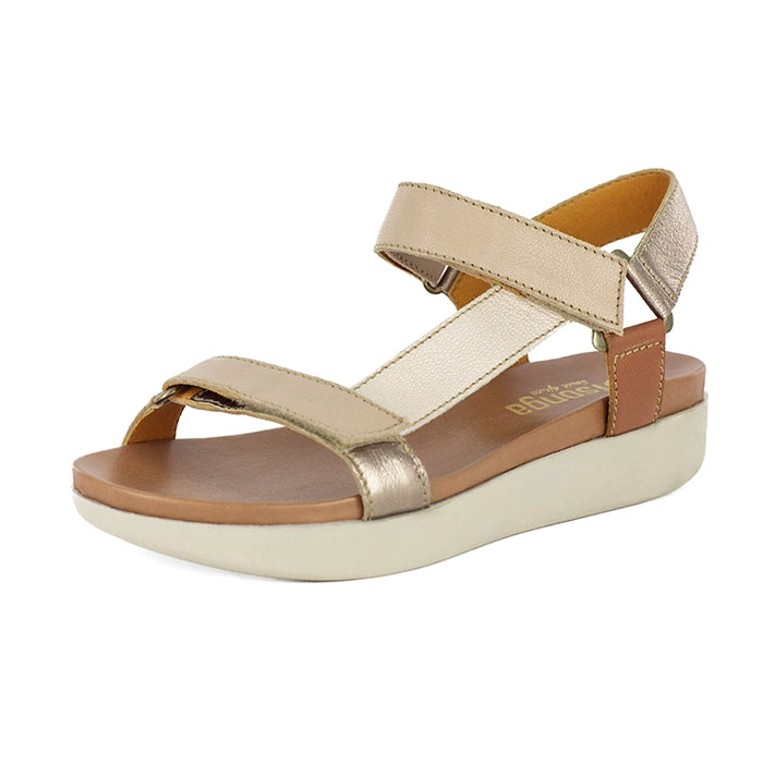 Beige sandal with brown sole on a white background