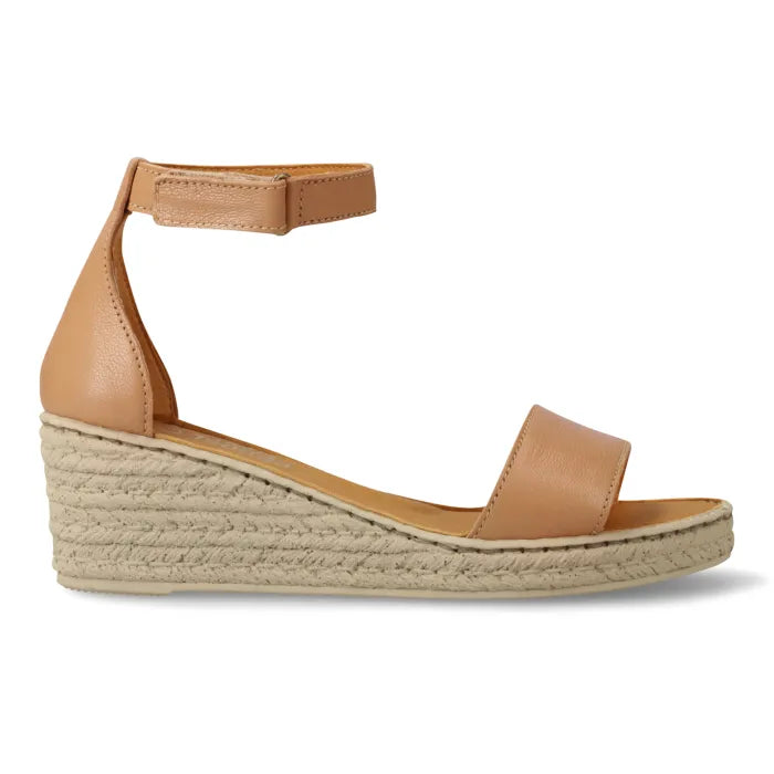 A tan leather wedge sandal with an ankle strap and platform sole, shown in a side profile on a white background.