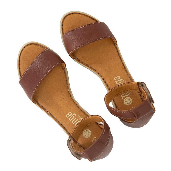 Pair of brown sandals with 'Tsonga' branding on a white background