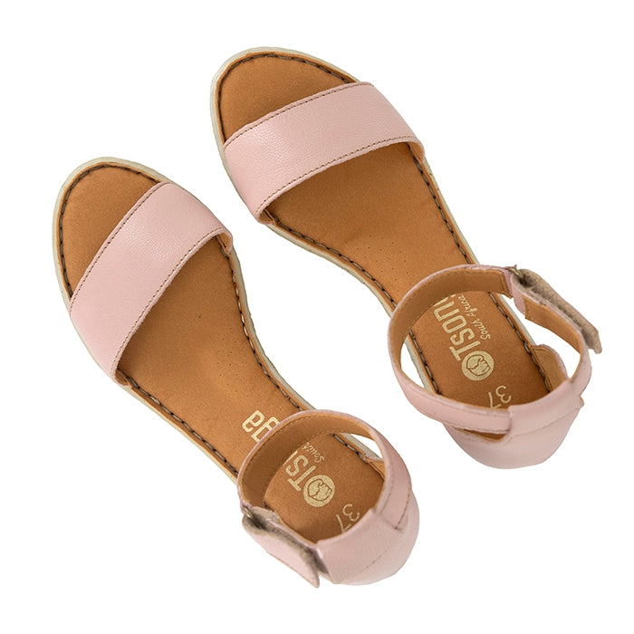 Pair of pink sandals with 'Tsonga' branding on a white background