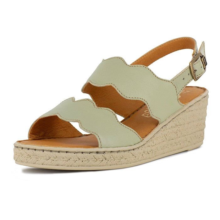 Light green wedge sandal on a white background
