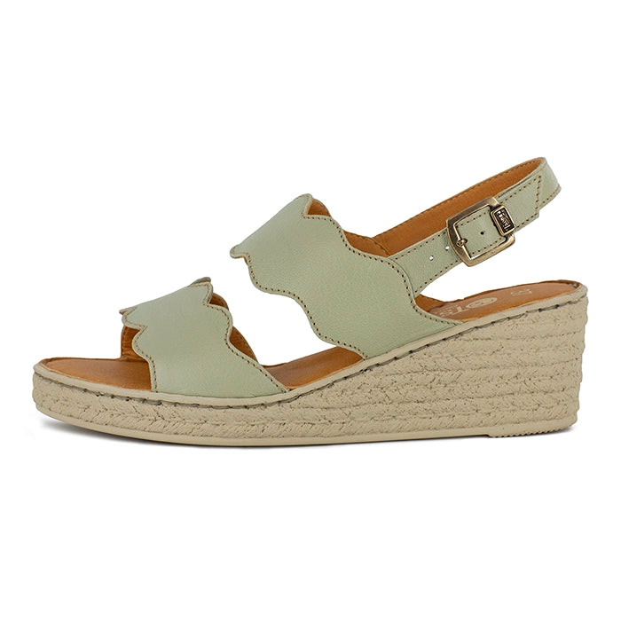 Light green wedge sandal on a white background