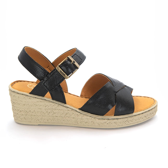 A single women's wedge sandals with black leather straps and a tan insole, shown on a white background.