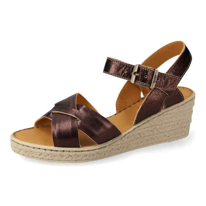 A metallic bronze wedge sandal with a wedge sole, featuring crisscrossed straps and an adjustable ankle strap with a buckle.