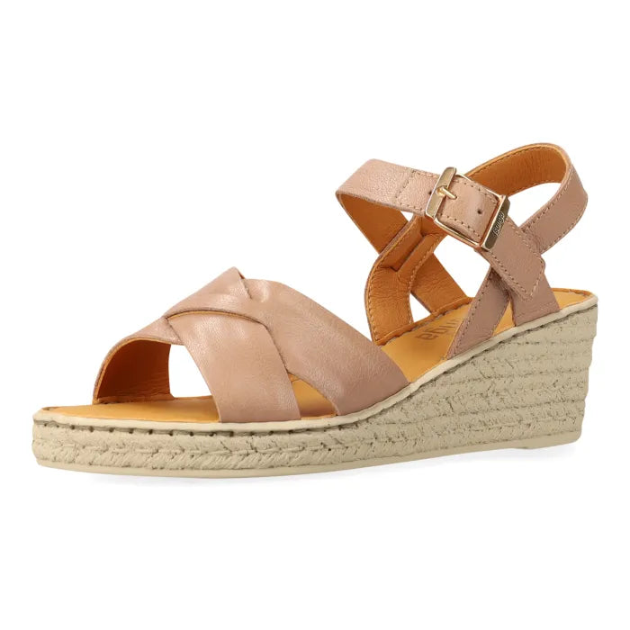 A single women's wedge sandal in a light tan leather with a wedge heel and a matching ankle strap with a gold-tone buckle, shown on a plain white background.
