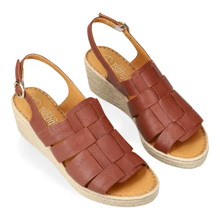 A pair of women's wedge sandals with brown woven leather straps and natural wedge heels, shown on a plain white background.