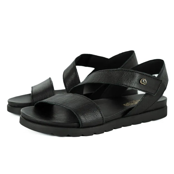 Black sandals with criss-cross straps on a white background