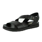 Black sandal with multiple straps on a white background