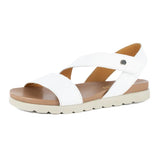 White sandal with off white sole on a white background