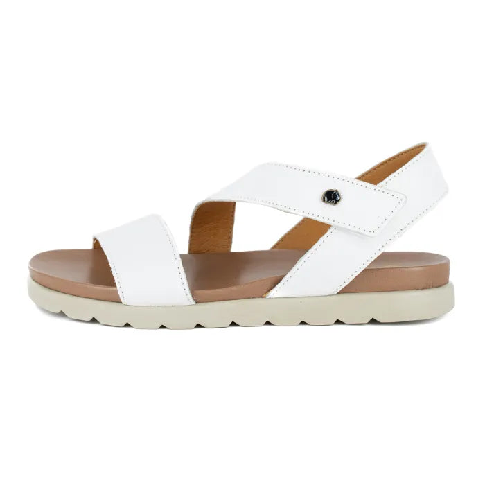 White sandal with off white sole on a white background
