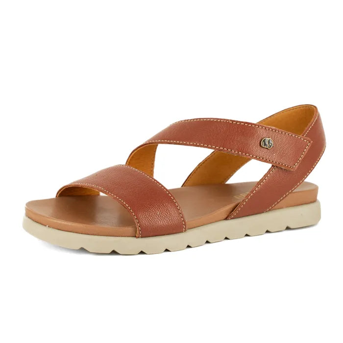 Brown sandal with a off white sole on a white background