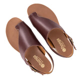 Pair of brown sandals with 'Tsonga' branding on a white background