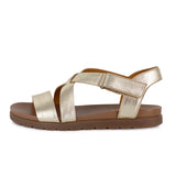Gold sandal with tan sole on a white background