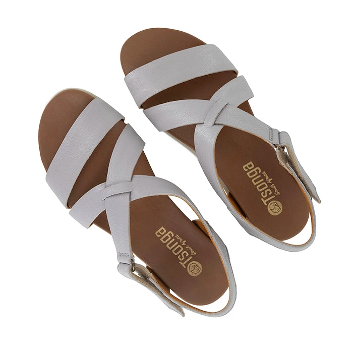 Pair of light grey sandals with off white soles on a white background