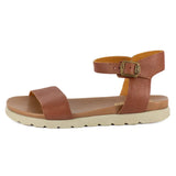 Brown sandal with a off-white sole on a white background