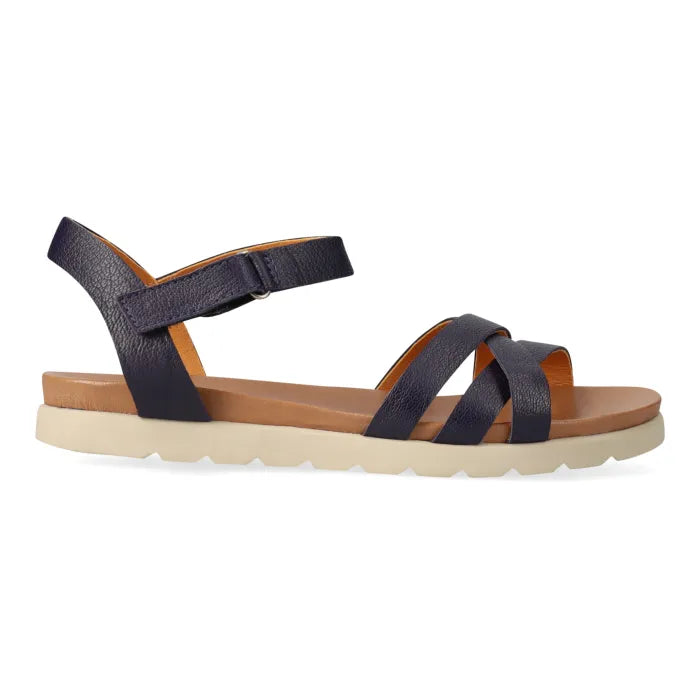 Navy sandals on off-white soles on a white background 