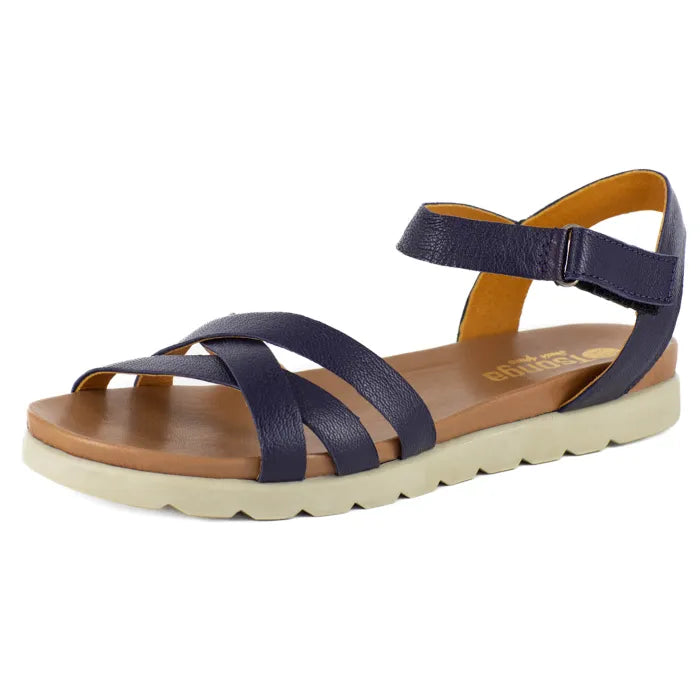 Navy sandal with a off white sole on a white background