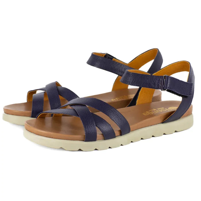 Navy sandals with off white soles on a white background