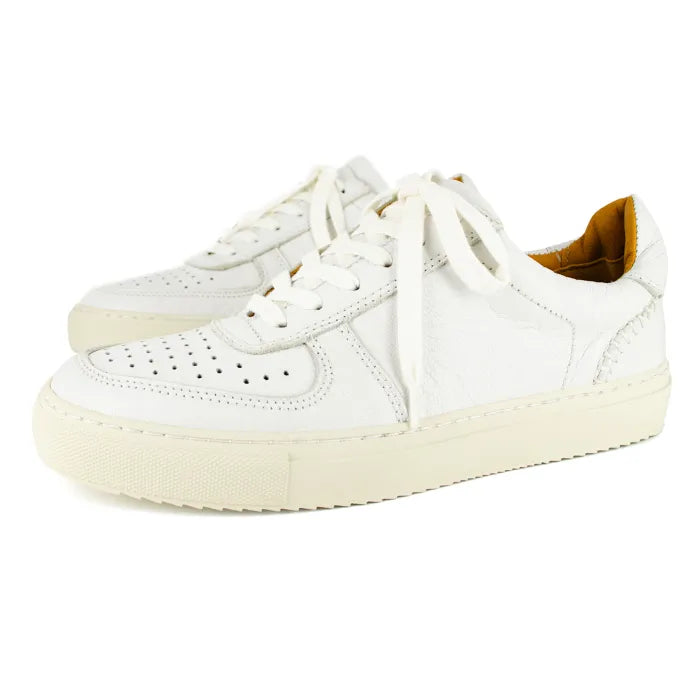 White sneakers with white soles on a white background
